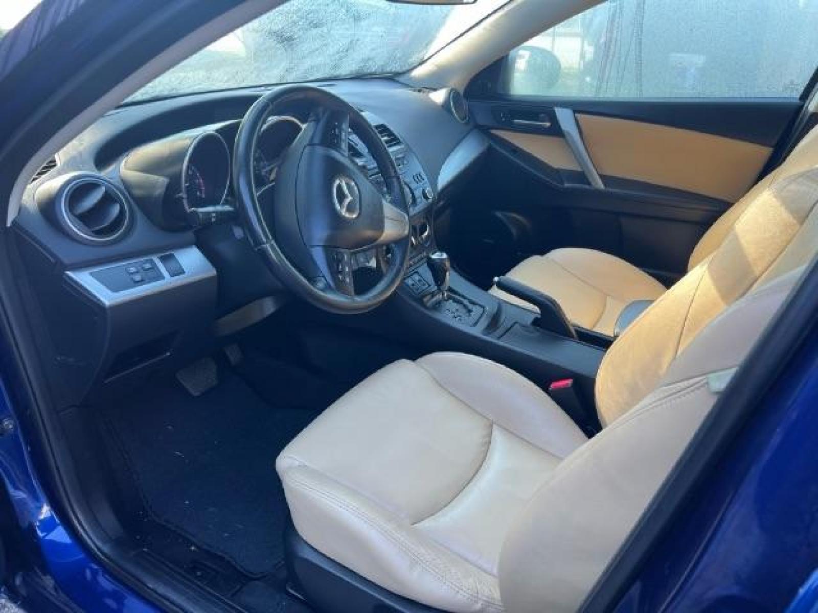 2012 Blue Mazda MAZDA3 I Grand Touring 4-Door (JM1BL1W76C1) with an 2.0L L4 DOHC 16V engine, located at 1806 Veterans Memorial Hwy SW, Austell, GA, 30168, (770) 944-9558, 33.817959, -84.606987 - Photo #6