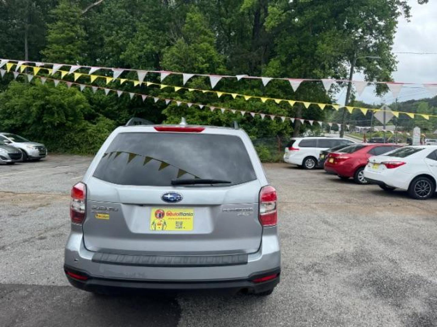 2016 Silver Subaru Forester 2.5i Premium PZEV CV (JF2SJADC1GH) with an 2.5L H4 SOHC 16V engine, Continuously Variabl transmission, located at 1806 Veterans Memorial Hwy SW, Austell, GA, 30168, (770) 944-9558, 33.817959, -84.606987 - Photo#4