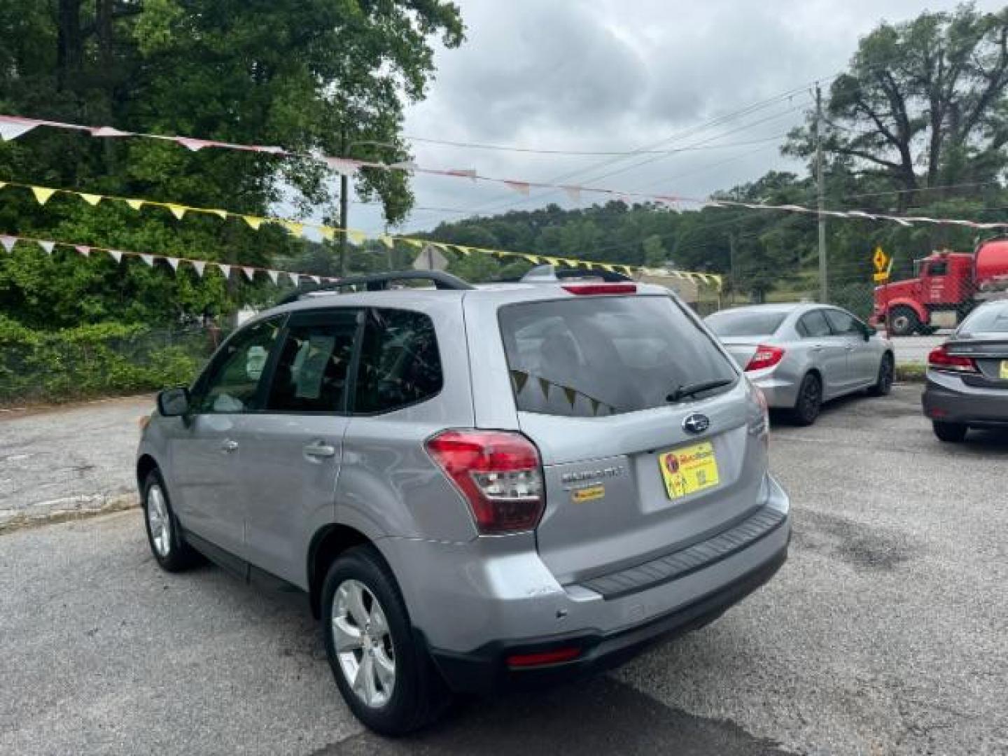 2016 Silver Subaru Forester 2.5i Premium PZEV CV (JF2SJADC1GH) with an 2.5L H4 SOHC 16V engine, Continuously Variabl transmission, located at 1806 Veterans Memorial Hwy SW, Austell, GA, 30168, (770) 944-9558, 33.817959, -84.606987 - Photo#5