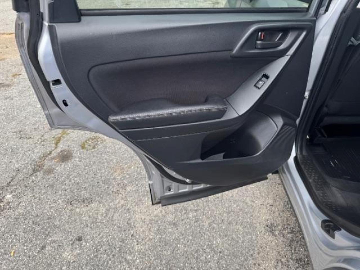 2016 Silver Subaru Forester 2.5i Premium PZEV CV (JF2SJADC1GH) with an 2.5L H4 SOHC 16V engine, Continuously Variabl transmission, located at 1806 Veterans Memorial Hwy SW, Austell, GA, 30168, (770) 944-9558, 33.817959, -84.606987 - Photo#10