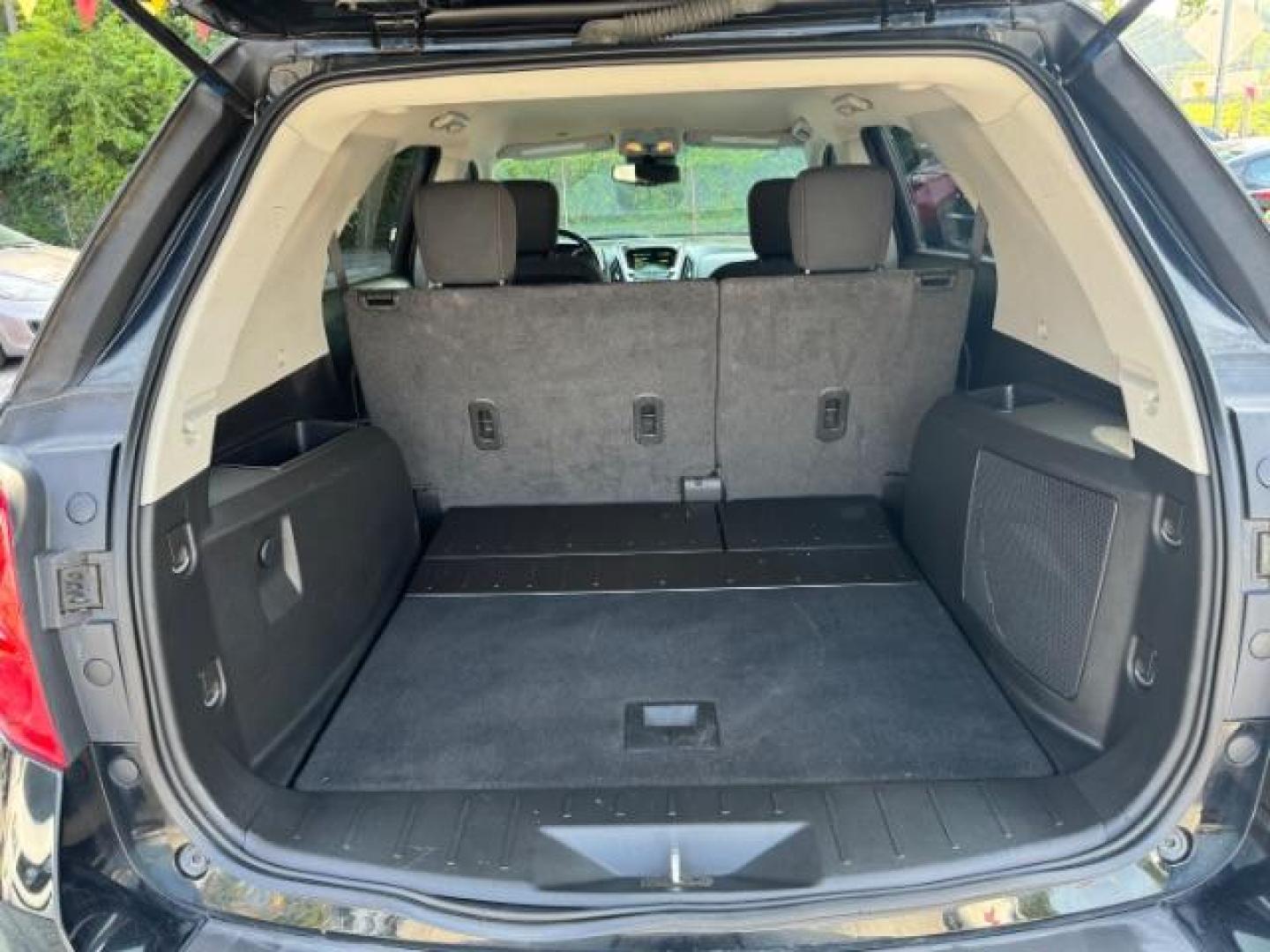 2014 Black Chevrolet Equinox 1LT 2WD (2GNALBEK9E1) with an 2.4L L4 DOHC 16V FFV engine, 6-Speed Automatic transmission, located at 1806 Veterans Memorial Hwy SW, Austell, GA, 30168, (770) 944-9558, 33.817959, -84.606987 - Photo#14