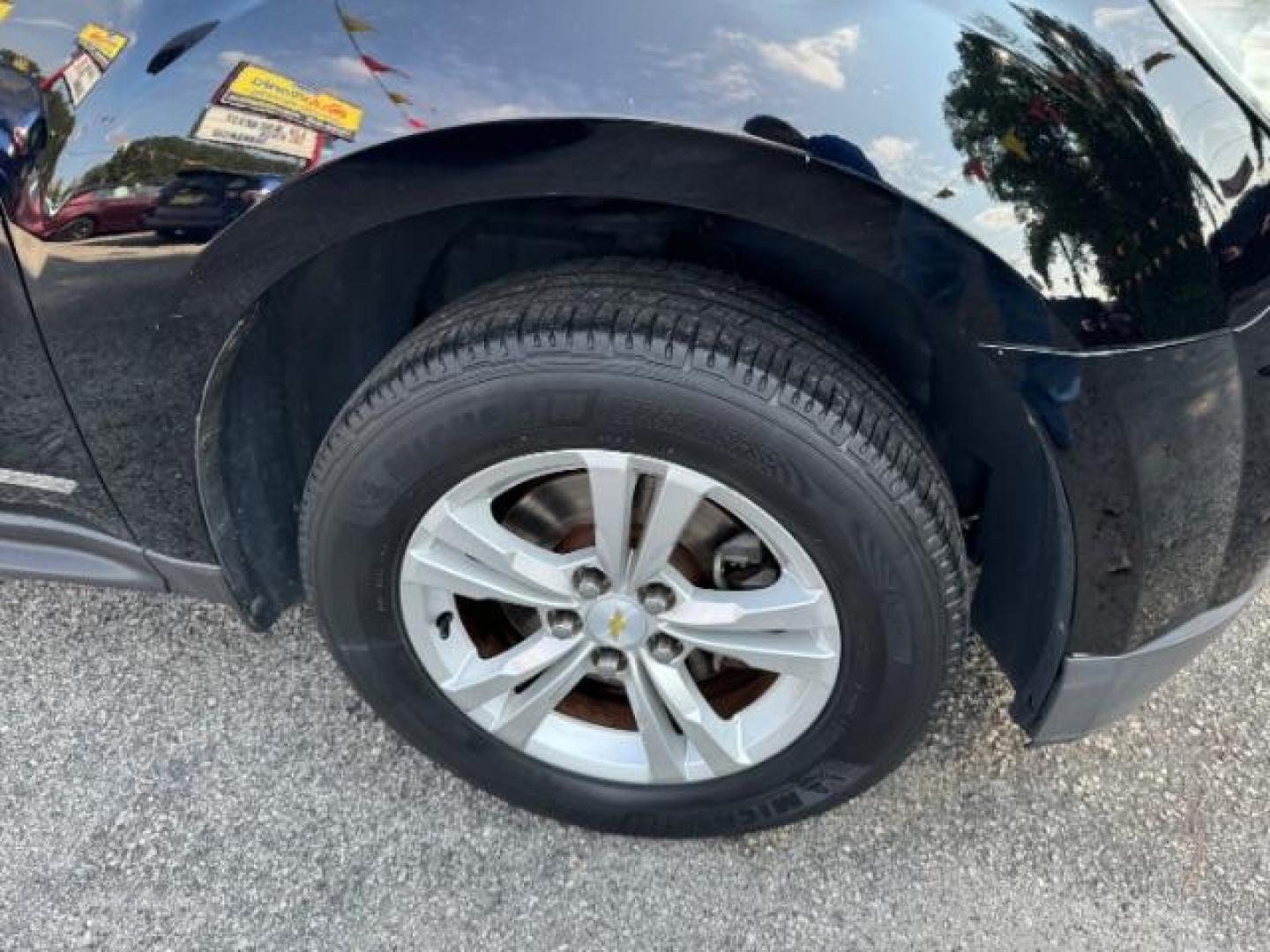 2014 Black Chevrolet Equinox 1LT 2WD (2GNALBEK9E1) with an 2.4L L4 DOHC 16V FFV engine, 6-Speed Automatic transmission, located at 1806 Veterans Memorial Hwy SW, Austell, GA, 30168, (770) 944-9558, 33.817959, -84.606987 - Photo#19
