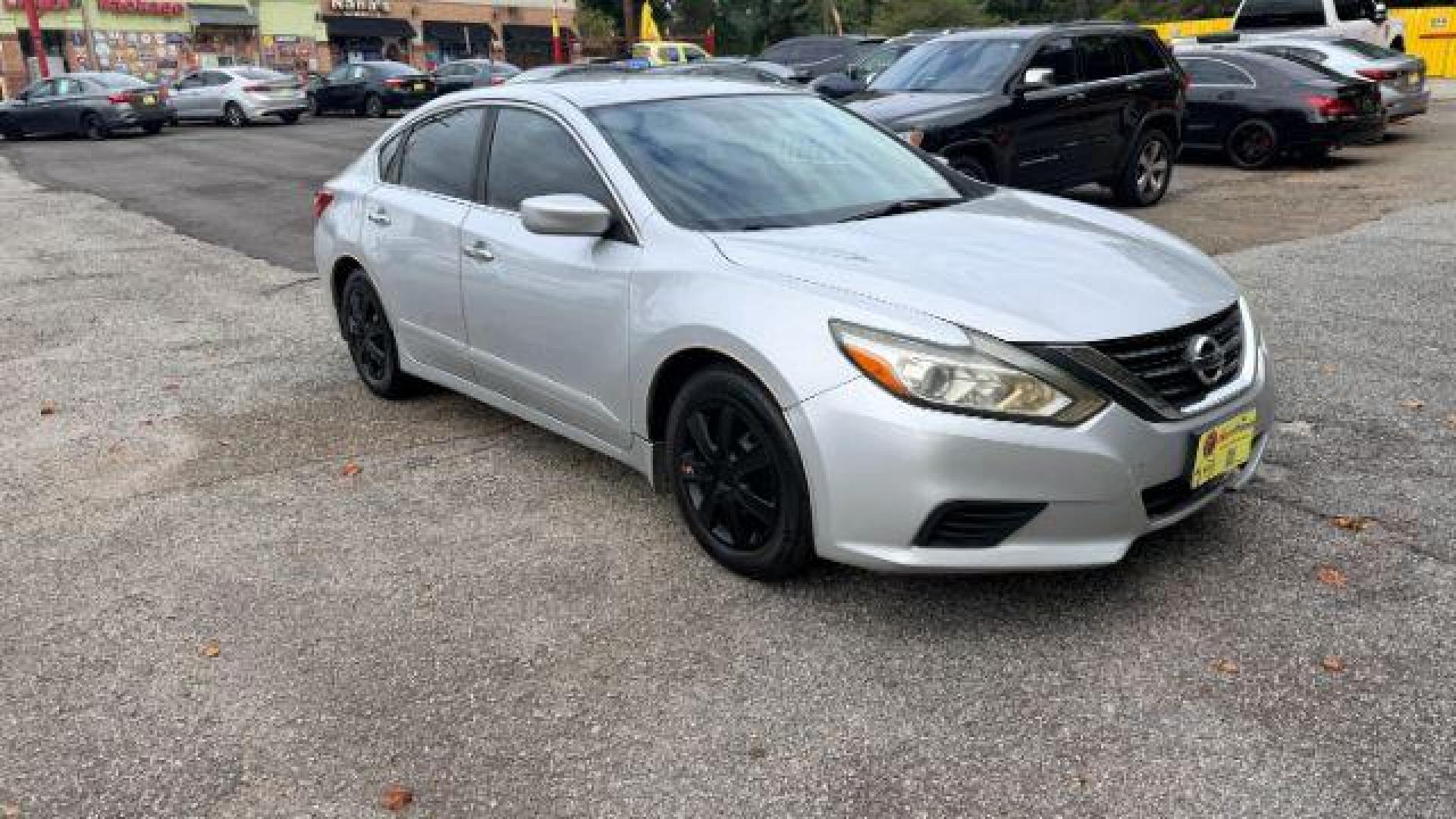 2017 Silver Nissan Altima 2.5 (1N4AL3AP6HN) with an 2.5L L4 DOHC 16V engine, Continuously Variabl transmission, located at 1806 Veterans Memorial Hwy SW, Austell, GA, 30168, (770) 944-9558, 33.817959, -84.606987 - Photo#2