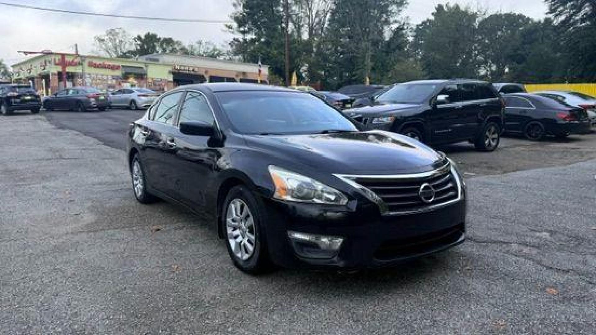 2014 Black Nissan Altima 2.5 (1N4AL3AP2EC) with an 2.5L L4 DOHC 16V engine, Continuously Variable Transmission transmission, located at 1806 Veterans Memorial Hwy SW, Austell, GA, 30168, (770) 944-9558, 33.817959, -84.606987 - Photo#2