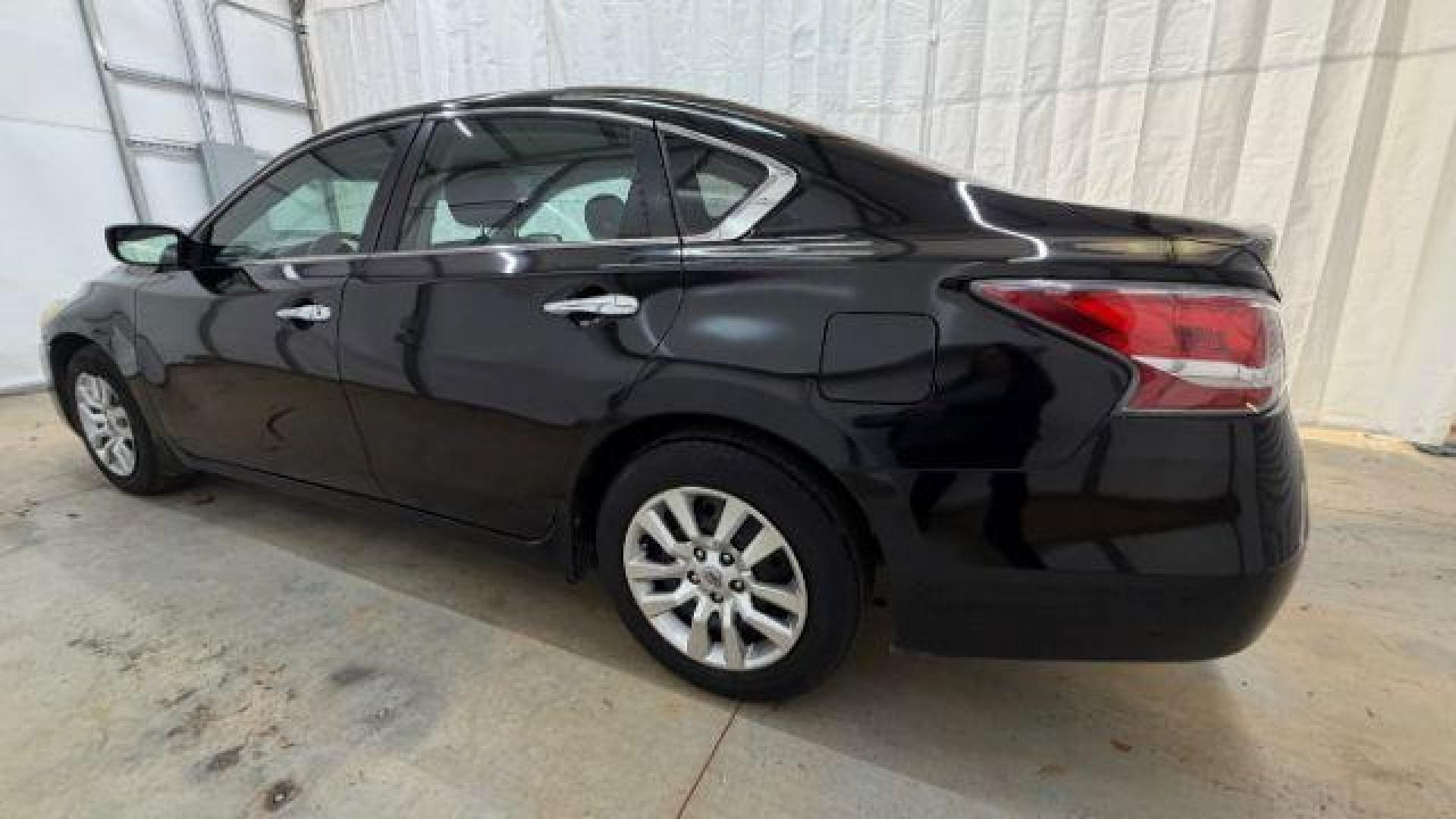 2014 Black Nissan Altima 2.5 (1N4AL3AP2EC) with an 2.5L L4 DOHC 16V engine, Continuously Variabl transmission, located at 1806 Veterans Memorial Hwy SW, Austell, GA, 30168, (770) 944-9558, 33.817959, -84.606987 - Photo#2