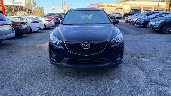 2014 Black Mazda CX-5 Touring (JM3KE2CY3E0) with an 2.5L L4 DOHC 16V engine, 6-Speed Automatic transmission, located at 1806 Veterans Memorial Hwy SW, Austell, GA, 30168, (770) 944-9558, 33.817959, -84.606987 - Photo#1