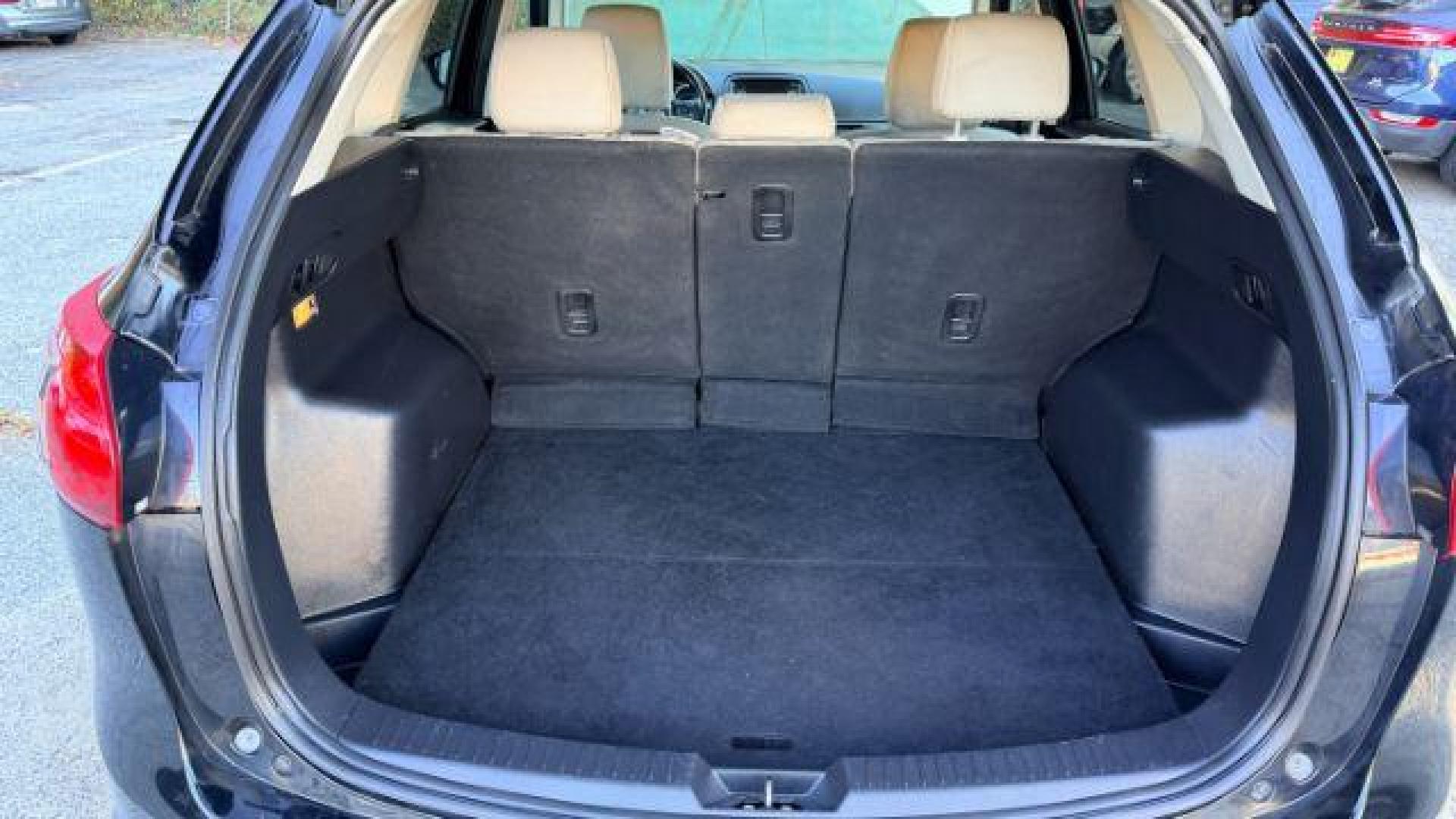 2014 Black Mazda CX-5 Touring (JM3KE2CY3E0) with an 2.5L L4 DOHC 16V engine, 6-Speed Automatic transmission, located at 1806 Veterans Memorial Hwy SW, Austell, GA, 30168, (770) 944-9558, 33.817959, -84.606987 - Photo#6