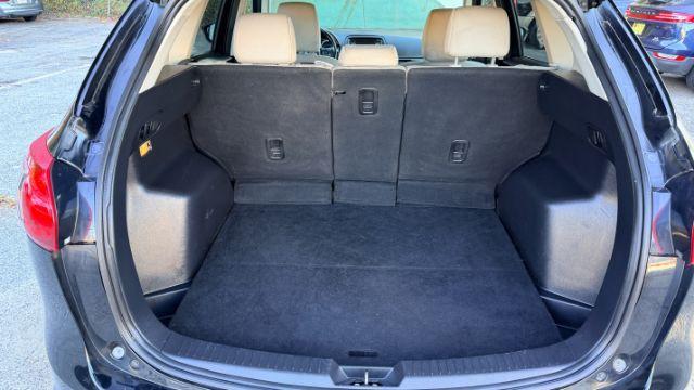 2014 Black Mazda CX-5 Touring (JM3KE2CY3E0) with an 2.5L L4 DOHC 16V engine, 6-Speed Automatic transmission, located at 1806 Veterans Memorial Hwy SW, Austell, GA, 30168, (770) 944-9558, 33.817959, -84.606987 - Photo#6