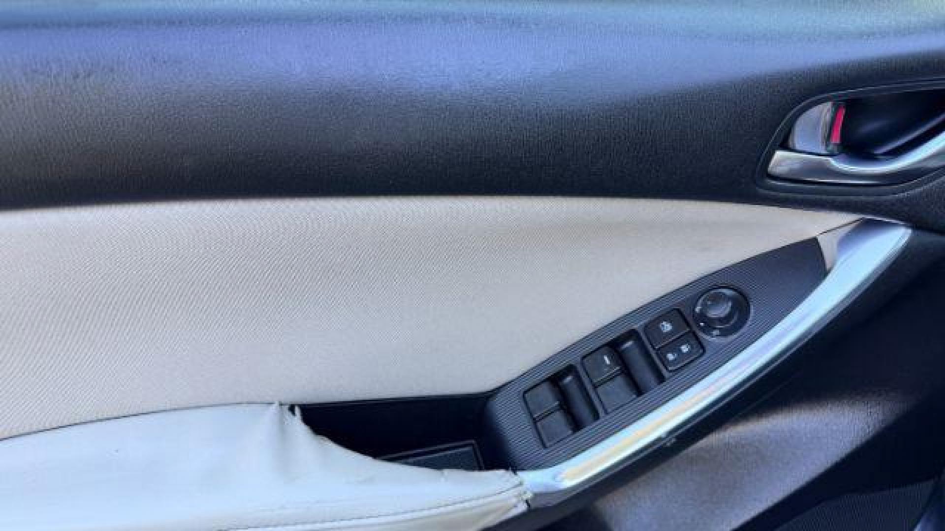 2014 Black Mazda CX-5 Touring (JM3KE2CY3E0) with an 2.5L L4 DOHC 16V engine, 6-Speed Automatic transmission, located at 1806 Veterans Memorial Hwy SW, Austell, GA, 30168, (770) 944-9558, 33.817959, -84.606987 - Photo#10