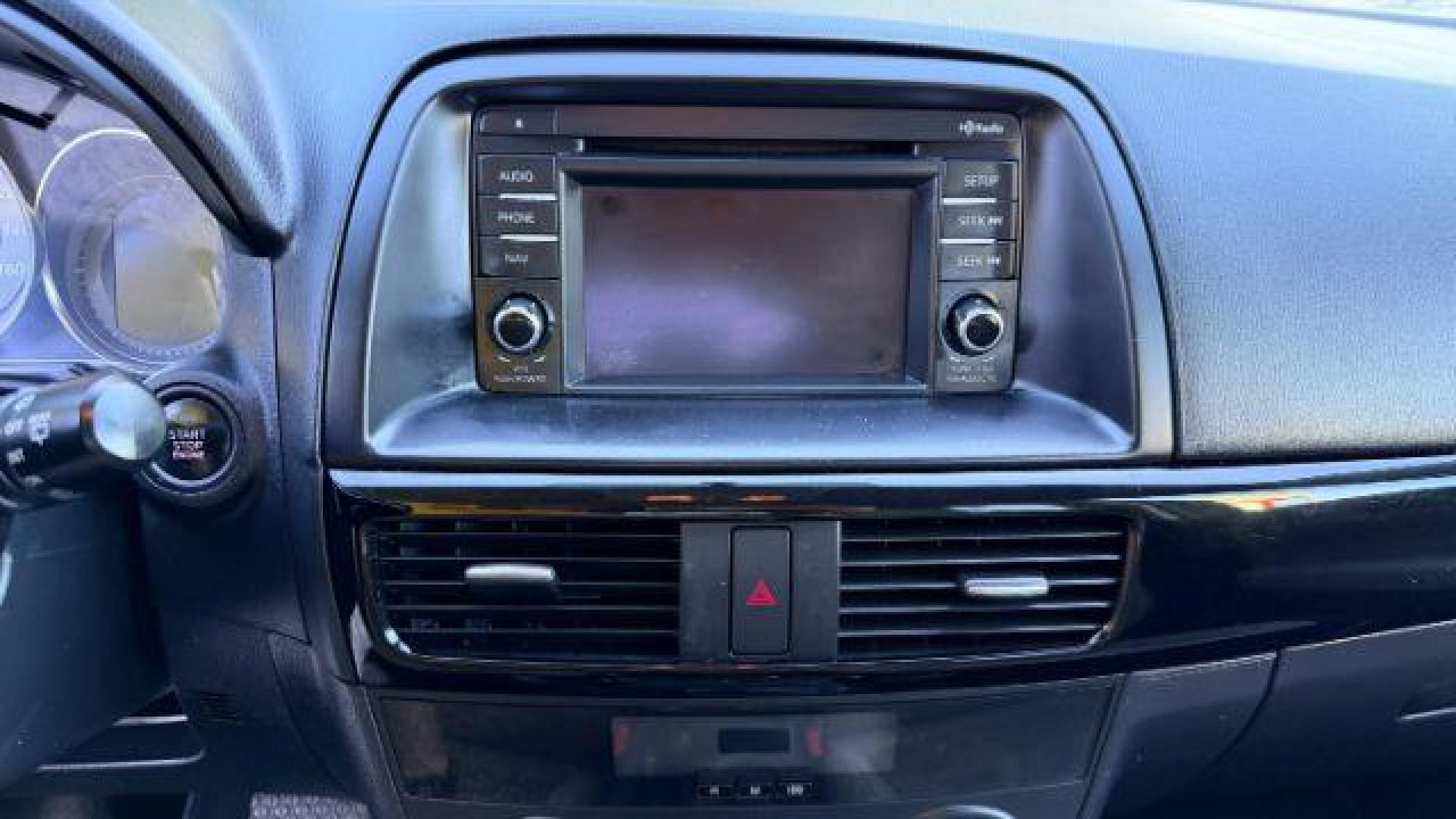 2014 Black Mazda CX-5 Touring (JM3KE2CY3E0) with an 2.5L L4 DOHC 16V engine, 6-Speed Automatic transmission, located at 1806 Veterans Memorial Hwy SW, Austell, GA, 30168, (770) 944-9558, 33.817959, -84.606987 - Photo#13