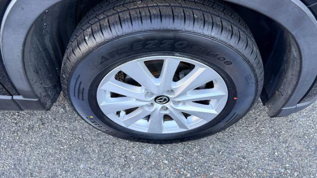 2014 Black Mazda CX-5 Touring (JM3KE2CY3E0) with an 2.5L L4 DOHC 16V engine, 6-Speed Automatic transmission, located at 1806 Veterans Memorial Hwy SW, Austell, GA, 30168, (770) 944-9558, 33.817959, -84.606987 - Photo#15