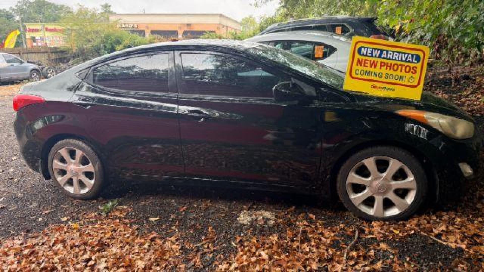 2013 Black Hyundai Elantra GLS A/T (KMHDH4AE3DU) with an 1.8L L4 DOHC 16V engine, 6-Speed Automatic transmission, located at 1806 Veterans Memorial Hwy SW, Austell, GA, 30168, (770) 944-9558, 33.817959, -84.606987 - Photo#0