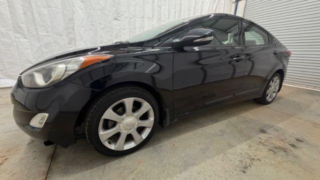 2013 Black Hyundai Elantra GLS A/T (KMHDH4AE3DU) with an 1.8L L4 DOHC 16V engine, 6-Speed Automatic transmission, located at 1806 Veterans Memorial Hwy SW, Austell, GA, 30168, (770) 944-9558, 33.817959, -84.606987 - Photo#1