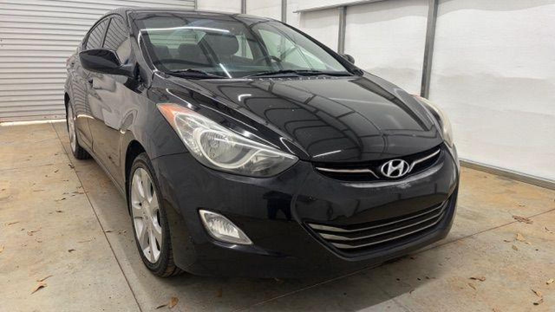 2013 Black Hyundai Elantra GLS A/T (KMHDH4AE3DU) with an 1.8L L4 DOHC 16V engine, 6-Speed Automatic transmission, located at 1806 Veterans Memorial Hwy SW, Austell, GA, 30168, (770) 944-9558, 33.817959, -84.606987 - Photo#8