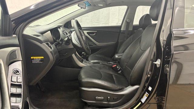 2013 Black Hyundai Elantra GLS A/T (KMHDH4AE3DU) with an 1.8L L4 DOHC 16V engine, 6-Speed Automatic transmission, located at 1806 Veterans Memorial Hwy SW, Austell, GA, 30168, (770) 944-9558, 33.817959, -84.606987 - Photo#11