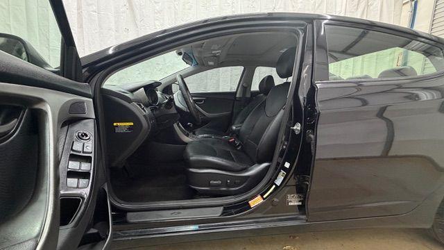 2013 Black Hyundai Elantra GLS A/T (KMHDH4AE3DU) with an 1.8L L4 DOHC 16V engine, 6-Speed Automatic transmission, located at 1806 Veterans Memorial Hwy SW, Austell, GA, 30168, (770) 944-9558, 33.817959, -84.606987 - Photo#12
