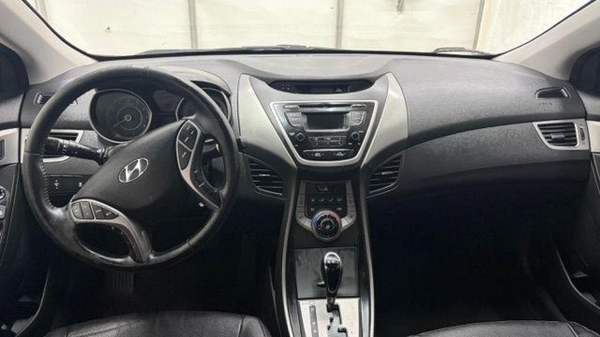 2013 Black Hyundai Elantra GLS A/T (KMHDH4AE3DU) with an 1.8L L4 DOHC 16V engine, 6-Speed Automatic transmission, located at 1806 Veterans Memorial Hwy SW, Austell, GA, 30168, (770) 944-9558, 33.817959, -84.606987 - Photo#15