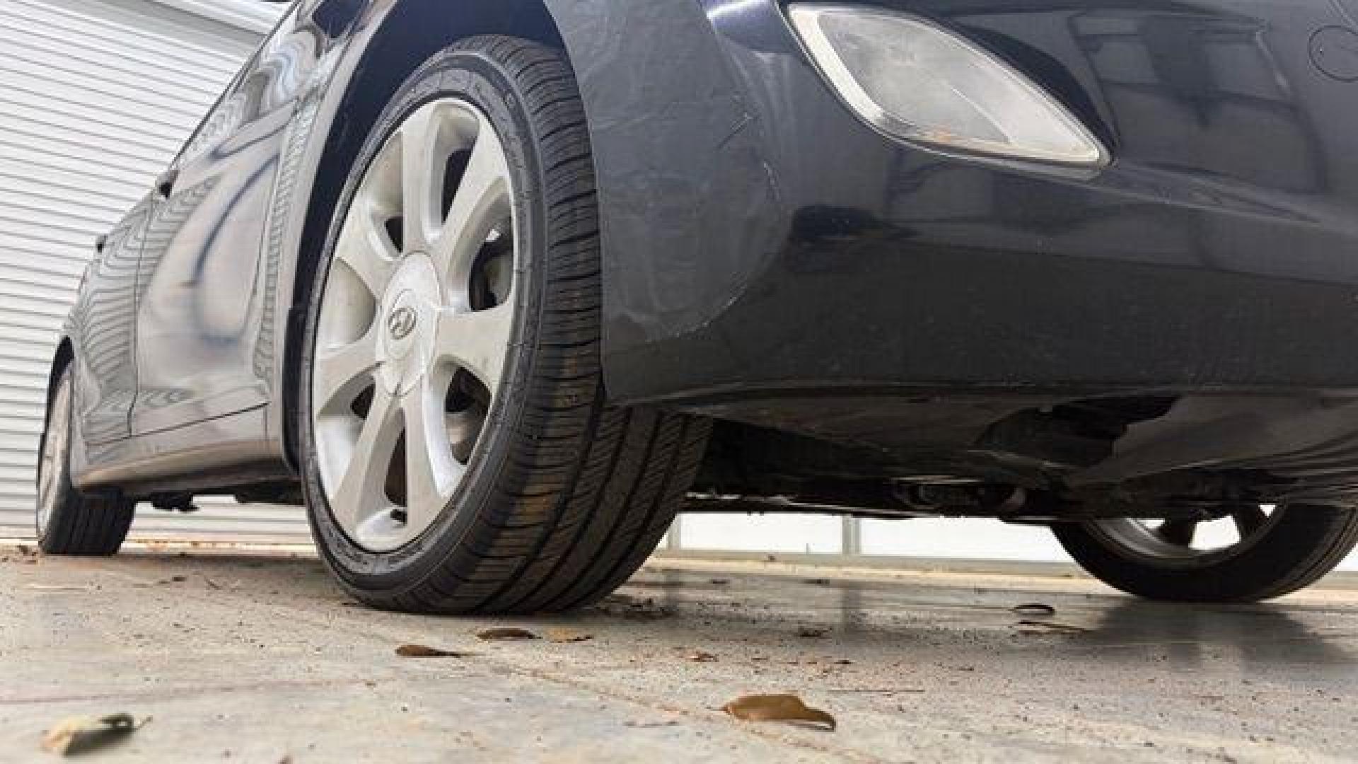 2013 Black Hyundai Elantra GLS A/T (KMHDH4AE3DU) with an 1.8L L4 DOHC 16V engine, 6-Speed Automatic transmission, located at 1806 Veterans Memorial Hwy SW, Austell, GA, 30168, (770) 944-9558, 33.817959, -84.606987 - Photo#18