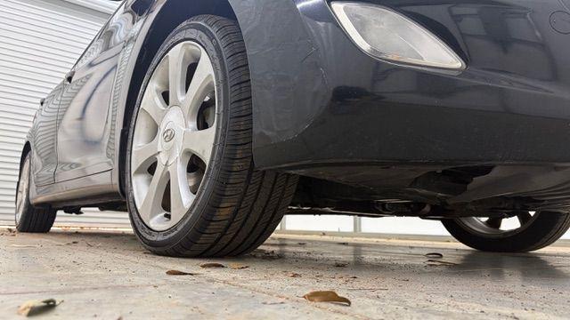 2013 Black Hyundai Elantra GLS A/T (KMHDH4AE3DU) with an 1.8L L4 DOHC 16V engine, 6-Speed Automatic transmission, located at 1806 Veterans Memorial Hwy SW, Austell, GA, 30168, (770) 944-9558, 33.817959, -84.606987 - Photo#18