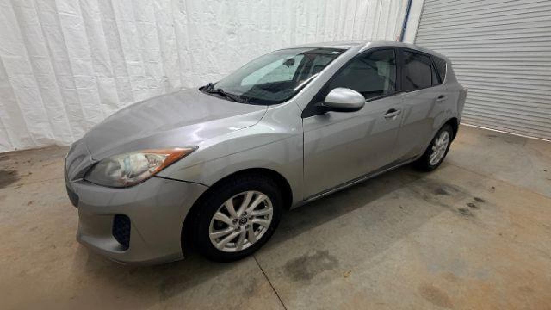 2013 Silver Mazda MAZDA3 i Touring AT 5-Door (JM1BL1L74D1) with an 2.0L L4 DOHC 16V engine, 5-Speed Automatic transmission, located at 1806 Veterans Memorial Hwy SW, Austell, GA, 30168, (770) 944-9558, 33.817959, -84.606987 - Photo#1