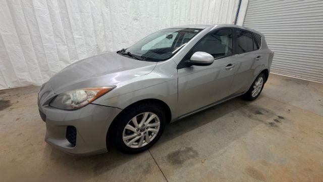 2013 Silver Mazda MAZDA3 i Touring AT 5-Door (JM1BL1L74D1) with an 2.0L L4 DOHC 16V engine, 5-Speed Automatic transmission, located at 1806 Veterans Memorial Hwy SW, Austell, GA, 30168, (770) 944-9558, 33.817959, -84.606987 - Photo#1