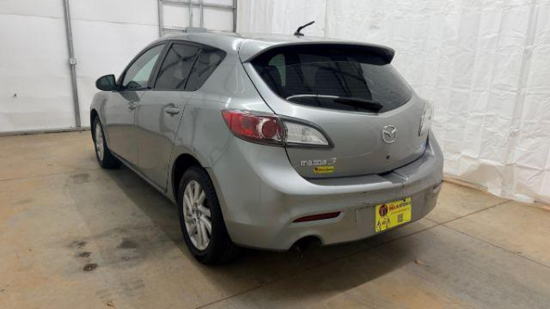 2013 Silver Mazda MAZDA3 i Touring AT 5-Door (JM1BL1L74D1) with an 2.0L L4 DOHC 16V engine, 5-Speed Automatic transmission, located at 1806 Veterans Memorial Hwy SW, Austell, GA, 30168, (770) 944-9558, 33.817959, -84.606987 - Photo#3