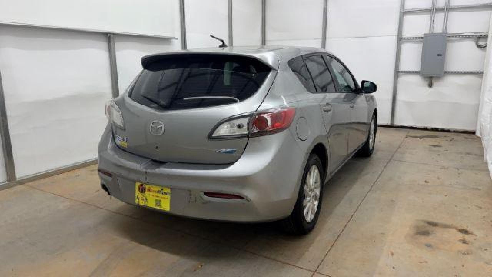 2013 Silver Mazda MAZDA3 i Touring AT 5-Door (JM1BL1L74D1) with an 2.0L L4 DOHC 16V engine, 5-Speed Automatic transmission, located at 1806 Veterans Memorial Hwy SW, Austell, GA, 30168, (770) 944-9558, 33.817959, -84.606987 - Photo#5