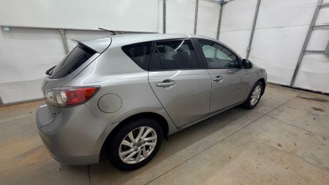 2013 Silver Mazda MAZDA3 i Touring AT 5-Door (JM1BL1L74D1) with an 2.0L L4 DOHC 16V engine, 5-Speed Automatic transmission, located at 1806 Veterans Memorial Hwy SW, Austell, GA, 30168, (770) 944-9558, 33.817959, -84.606987 - Photo#6