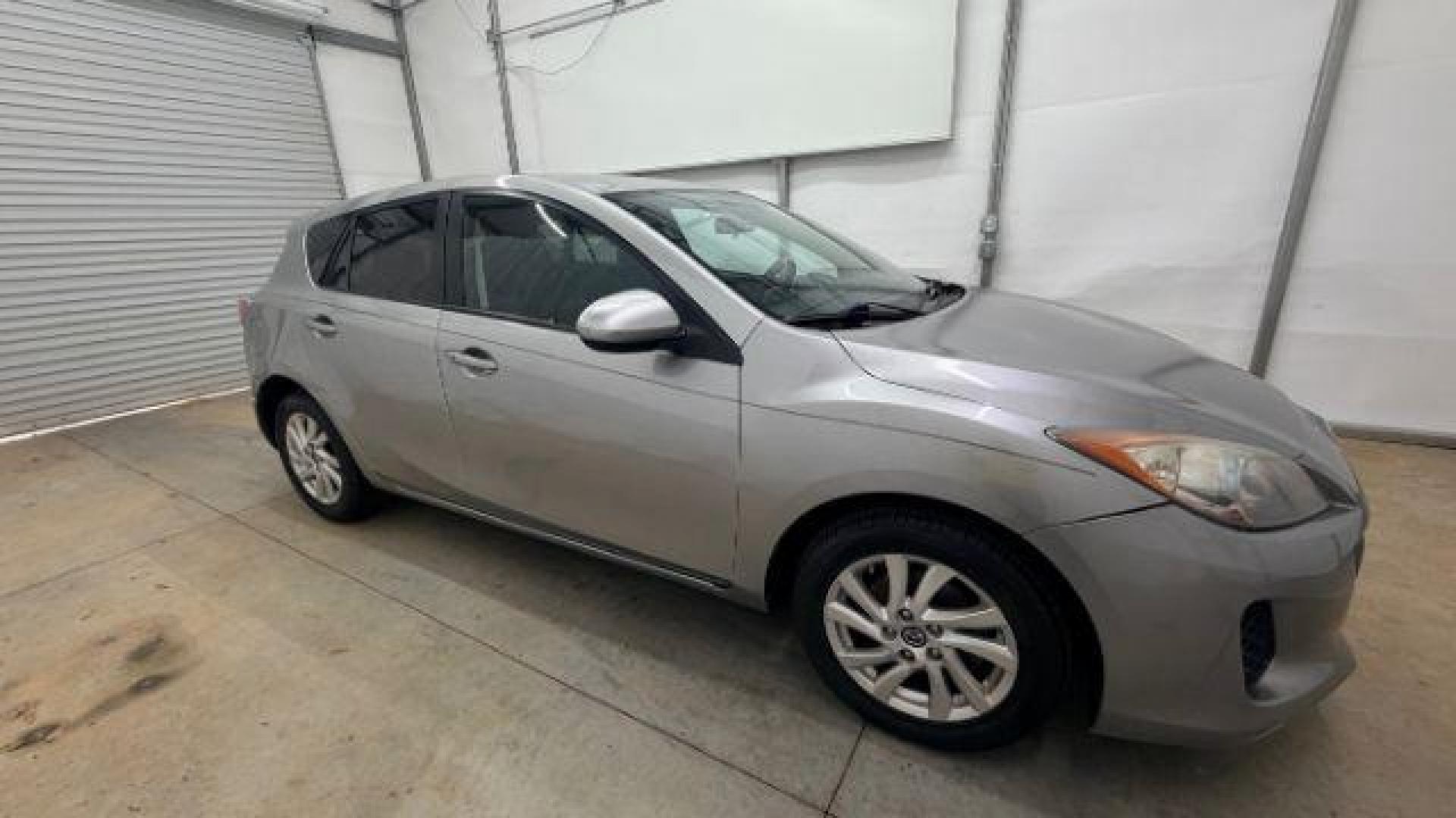 2013 Silver Mazda MAZDA3 i Touring AT 5-Door (JM1BL1L74D1) with an 2.0L L4 DOHC 16V engine, 5-Speed Automatic transmission, located at 1806 Veterans Memorial Hwy SW, Austell, GA, 30168, (770) 944-9558, 33.817959, -84.606987 - Photo#7
