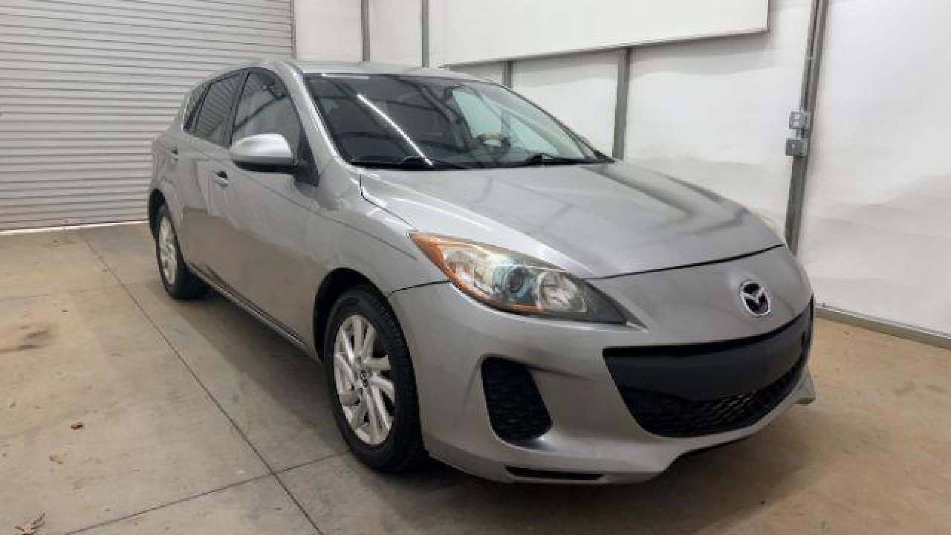 2013 Silver Mazda MAZDA3 i Touring AT 5-Door (JM1BL1L74D1) with an 2.0L L4 DOHC 16V engine, 5-Speed Automatic transmission, located at 1806 Veterans Memorial Hwy SW, Austell, GA, 30168, (770) 944-9558, 33.817959, -84.606987 - Photo#8