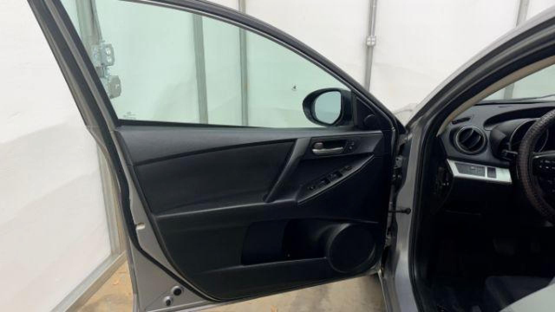 2013 Silver Mazda MAZDA3 i Touring AT 5-Door (JM1BL1L74D1) with an 2.0L L4 DOHC 16V engine, 5-Speed Automatic transmission, located at 1806 Veterans Memorial Hwy SW, Austell, GA, 30168, (770) 944-9558, 33.817959, -84.606987 - Photo#10