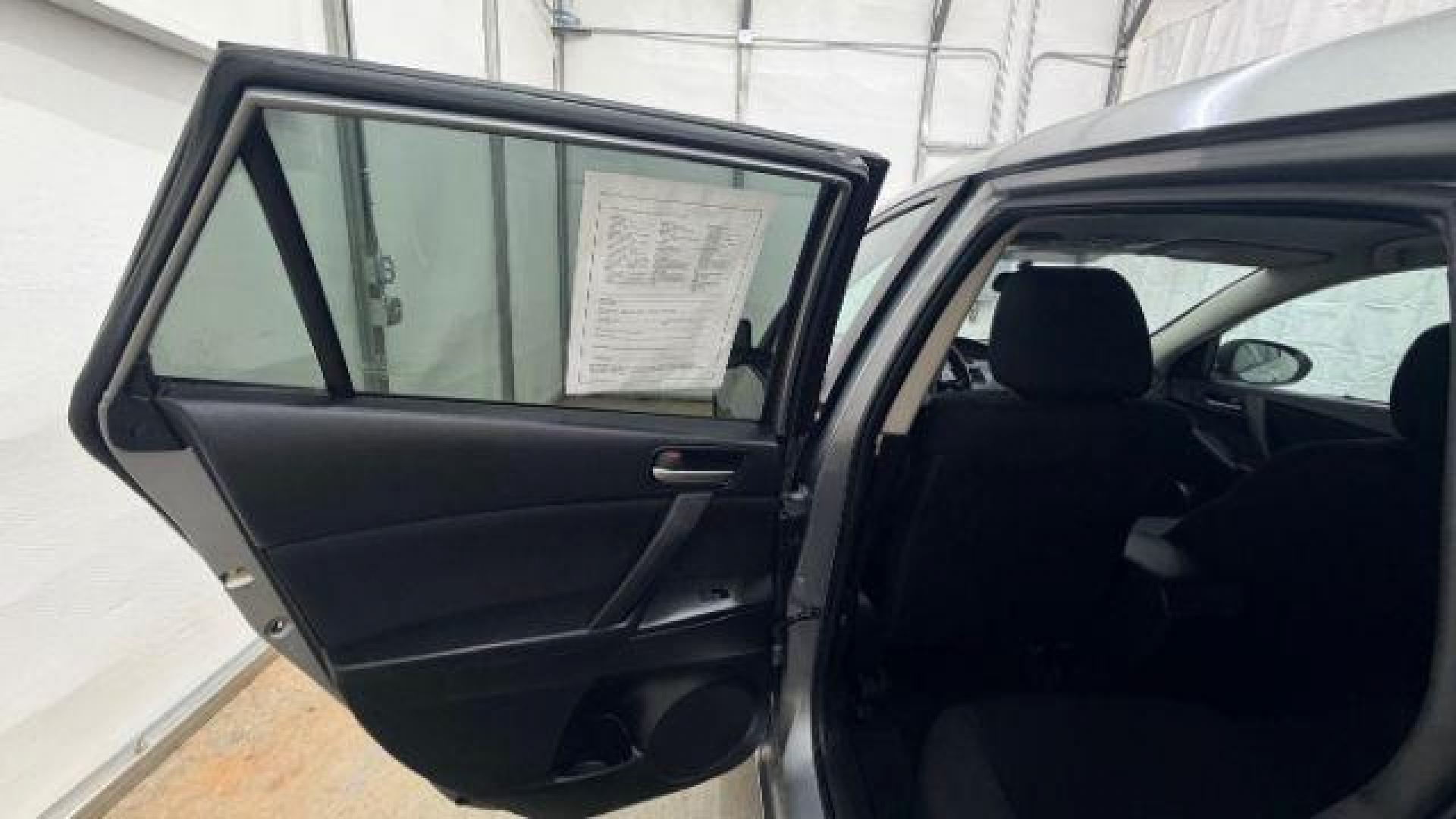 2013 Silver Mazda MAZDA3 i Touring AT 5-Door (JM1BL1L74D1) with an 2.0L L4 DOHC 16V engine, 5-Speed Automatic transmission, located at 1806 Veterans Memorial Hwy SW, Austell, GA, 30168, (770) 944-9558, 33.817959, -84.606987 - Photo#13