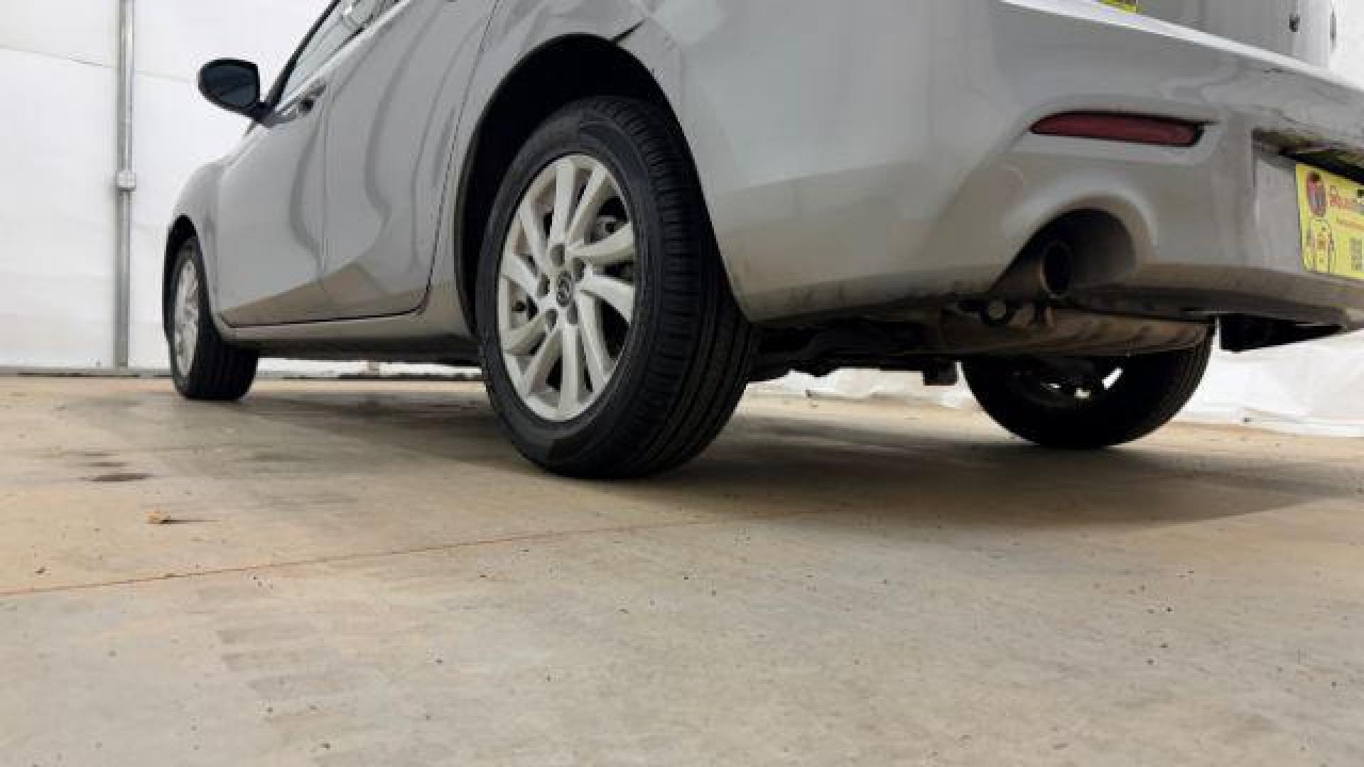 2013 Silver Mazda MAZDA3 i Touring AT 5-Door (JM1BL1L74D1) with an 2.0L L4 DOHC 16V engine, 5-Speed Automatic transmission, located at 1806 Veterans Memorial Hwy SW, Austell, GA, 30168, (770) 944-9558, 33.817959, -84.606987 - Photo#20