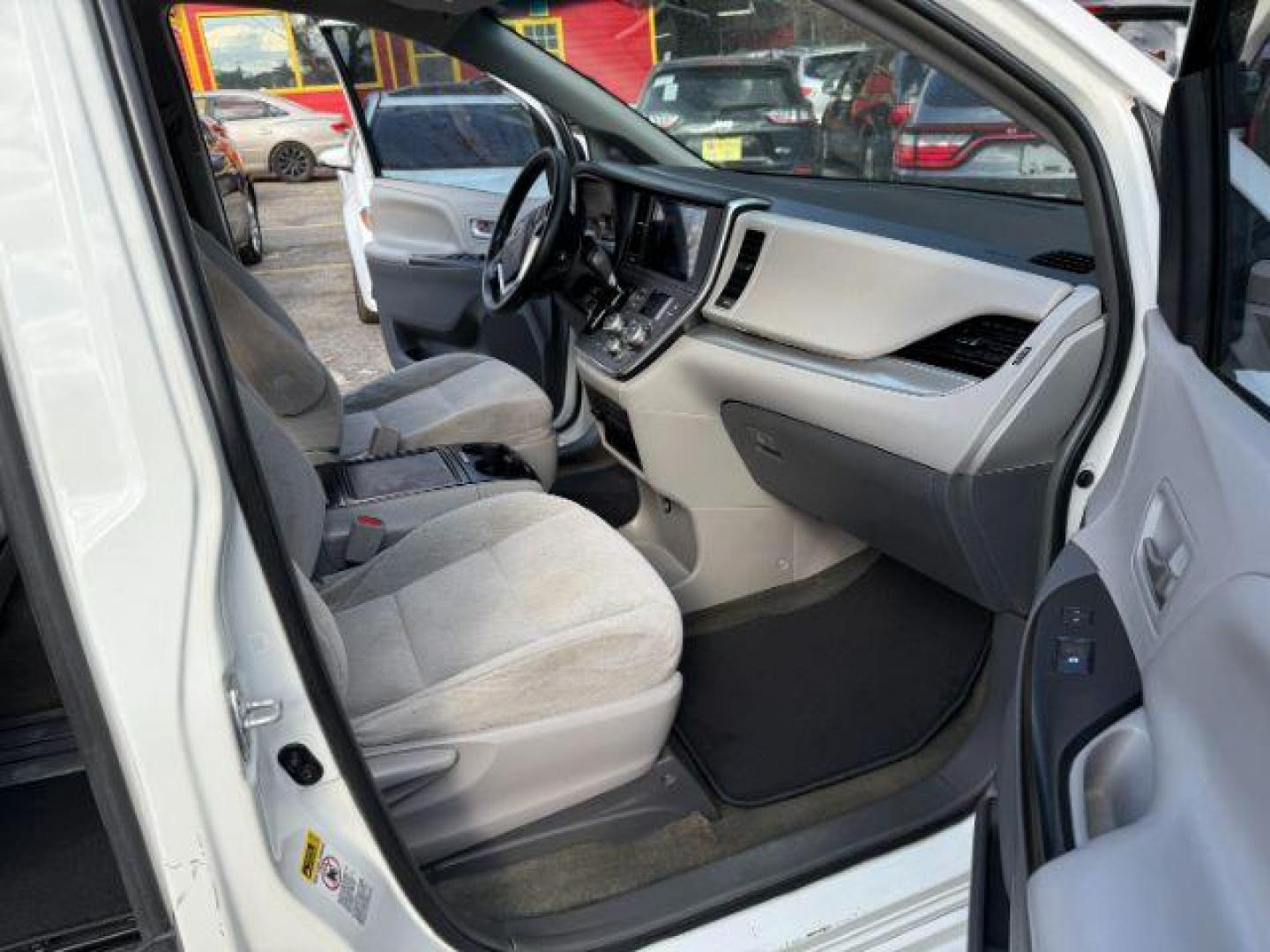 2016 White Toyota Sienna LE FWD 8-Passenger V6 (5TDKK3DC3GS) with an 3.5L V6 EFI DOHC 24V engine, 5-Speed Automatic transmission, located at 1806 Veterans Memorial Hwy SW, Austell, GA, 30168, (770) 944-9558, 33.817959, -84.606987 - Photo#0