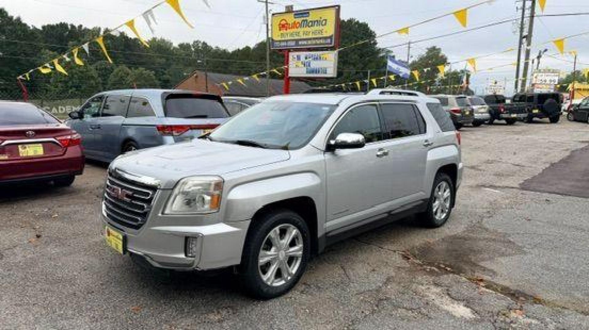 2016 Silver GMC Terrain SLT FWD (2GKALPEK4G6) with an 2.4L L4 DOHC 16V engine, 6-Speed Automatic transmission, located at 1806 Veterans Memorial Hwy SW, Austell, GA, 30168, (770) 944-9558, 33.817959, -84.606987 - Photo#0