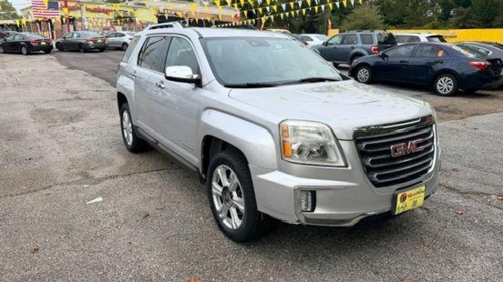 2016 Silver GMC Terrain SLT FWD (2GKALPEK4G6) with an 2.4L L4 DOHC 16V engine, 6-Speed Automatic transmission, located at 1806 Veterans Memorial Hwy SW, Austell, GA, 30168, (770) 944-9558, 33.817959, -84.606987 - Photo#2