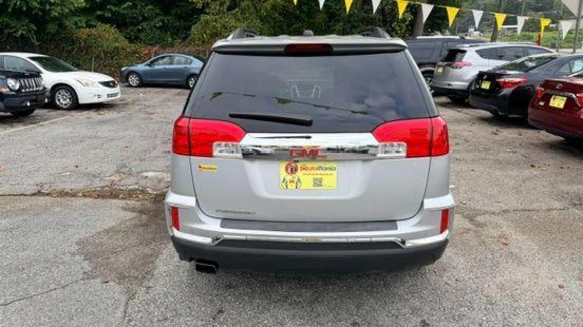 2016 Silver GMC Terrain SLT FWD (2GKALPEK4G6) with an 2.4L L4 DOHC 16V engine, 6-Speed Automatic transmission, located at 1806 Veterans Memorial Hwy SW, Austell, GA, 30168, (770) 944-9558, 33.817959, -84.606987 - Photo#4