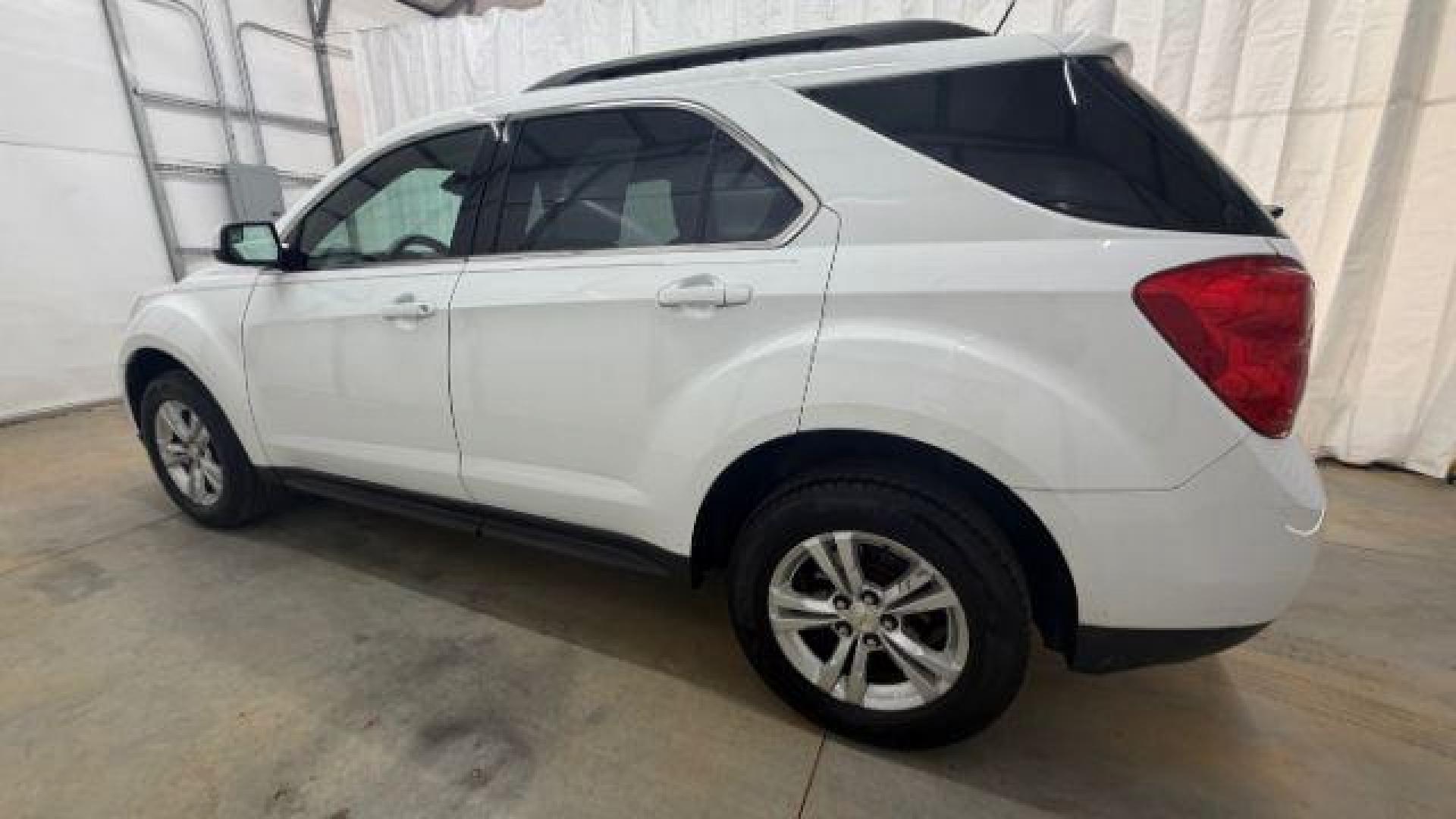 2014 White Chevrolet Equinox 2LT 2WD (2GNALCEKXE6) with an 2.4L L4 DOHC 16V FFV engine, 6-Speed Automatic transmission, located at 1806 Veterans Memorial Hwy SW, Austell, GA, 30168, (770) 944-9558, 33.817959, -84.606987 - Photo#2