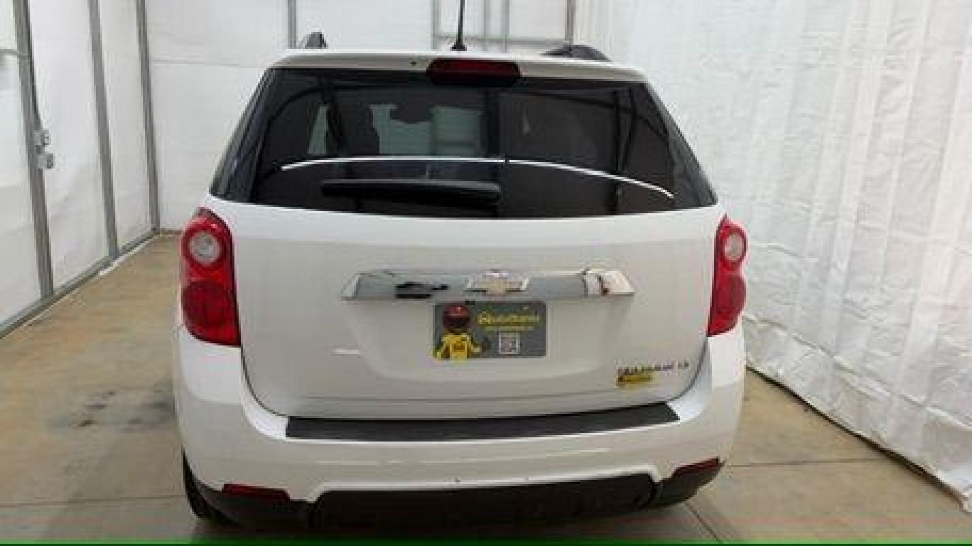 2014 White Chevrolet Equinox 2LT 2WD (2GNALCEKXE6) with an 2.4L L4 DOHC 16V FFV engine, 6-Speed Automatic transmission, located at 1806 Veterans Memorial Hwy SW, Austell, GA, 30168, (770) 944-9558, 33.817959, -84.606987 - Photo#4