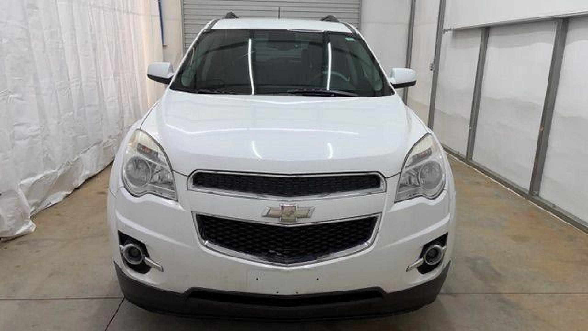 2014 White Chevrolet Equinox 2LT 2WD (2GNALCEKXE6) with an 2.4L L4 DOHC 16V FFV engine, 6-Speed Automatic transmission, located at 1806 Veterans Memorial Hwy SW, Austell, GA, 30168, (770) 944-9558, 33.817959, -84.606987 - Photo#9