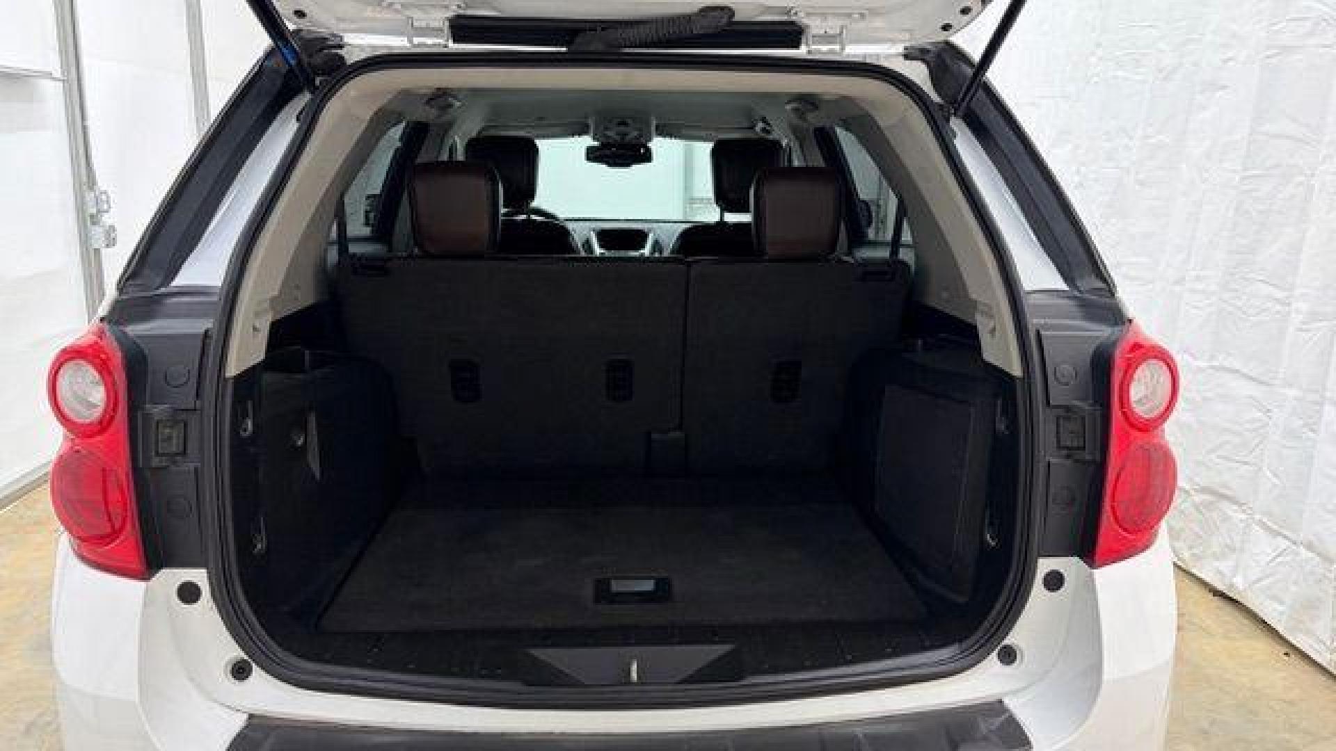 2014 White Chevrolet Equinox 2LT 2WD (2GNALCEKXE6) with an 2.4L L4 DOHC 16V FFV engine, 6-Speed Automatic transmission, located at 1806 Veterans Memorial Hwy SW, Austell, GA, 30168, (770) 944-9558, 33.817959, -84.606987 - Photo#16