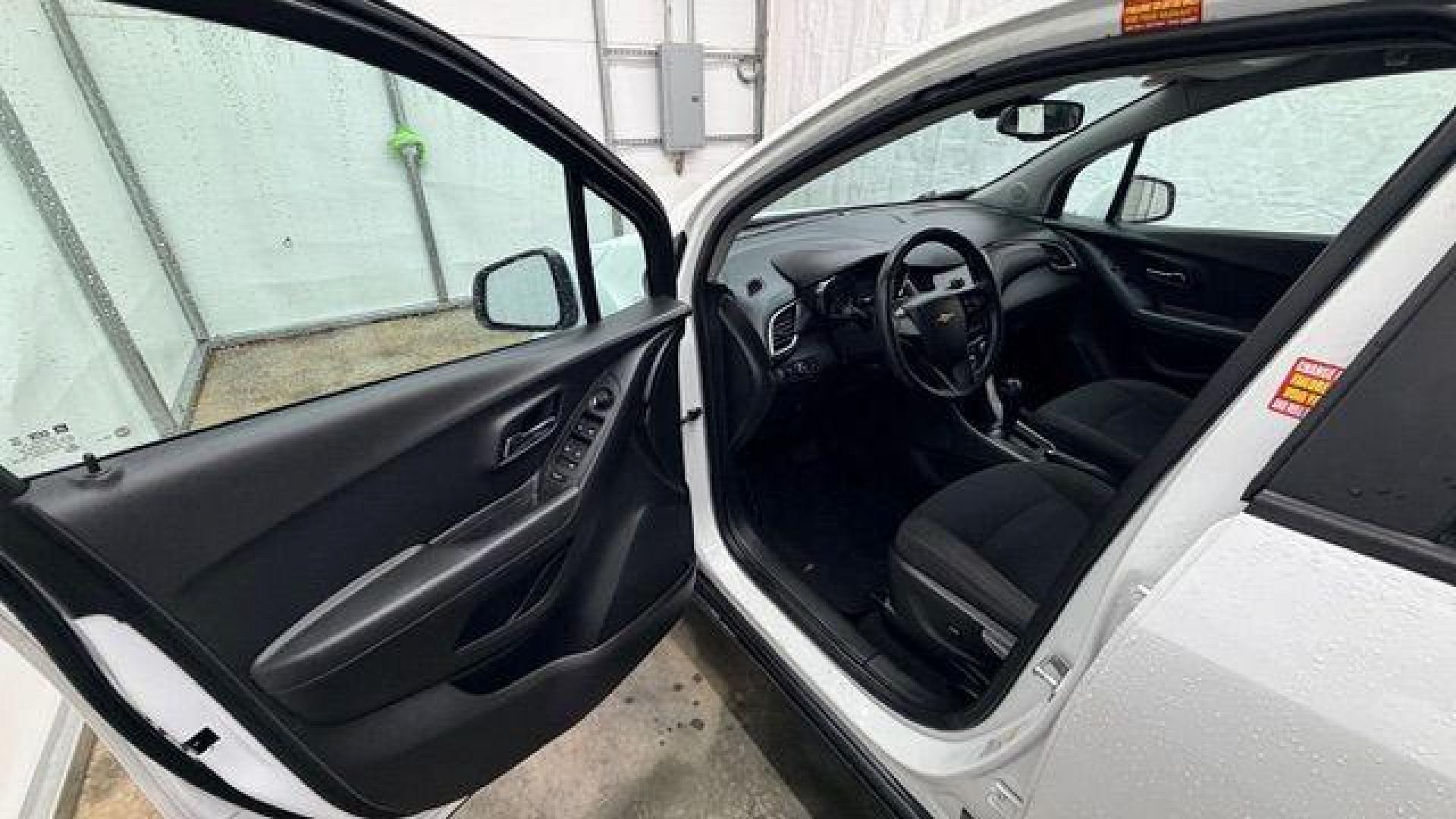 2017 White Chevrolet Trax LS FWD (KL7CJKSB8HB) with an 1.4L L4 DOHC 16V engine, 6-Speed Automatic transmission, located at 1806 Veterans Memorial Hwy SW, Austell, GA, 30168, (770) 944-9558, 33.817959, -84.606987 - Photo#11