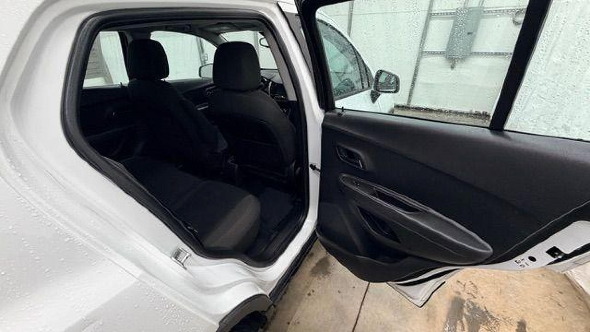 2017 White Chevrolet Trax LS FWD (KL7CJKSB8HB) with an 1.4L L4 DOHC 16V engine, 6-Speed Automatic transmission, located at 1806 Veterans Memorial Hwy SW, Austell, GA, 30168, (770) 944-9558, 33.817959, -84.606987 - Photo#16