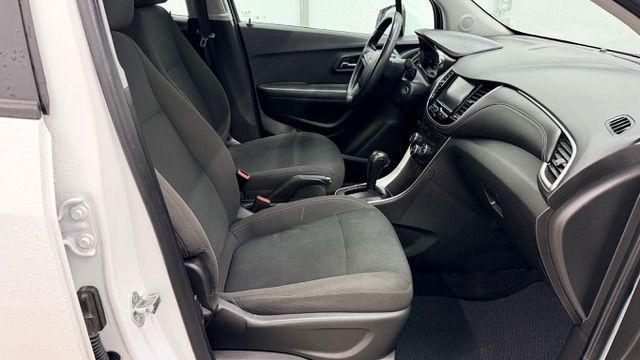 2017 White Chevrolet Trax LS FWD (KL7CJKSB8HB) with an 1.4L L4 DOHC 16V engine, 6-Speed Automatic transmission, located at 1806 Veterans Memorial Hwy SW, Austell, GA, 30168, (770) 944-9558, 33.817959, -84.606987 - Photo#19