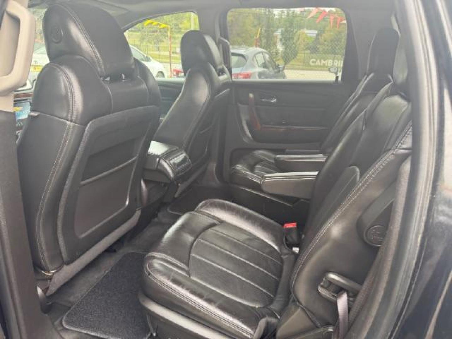2013 BLACK Chevrolet Traverse LTZ FWD (1GNKRLKD1DJ) with an 3.6L V6 DOHC 24V engine, 6-Speed Automatic transmission, located at 1806 Veterans Memorial Hwy SW, Austell, GA, 30168, (770) 944-9558, 33.817959, -84.606987 - Photo#9