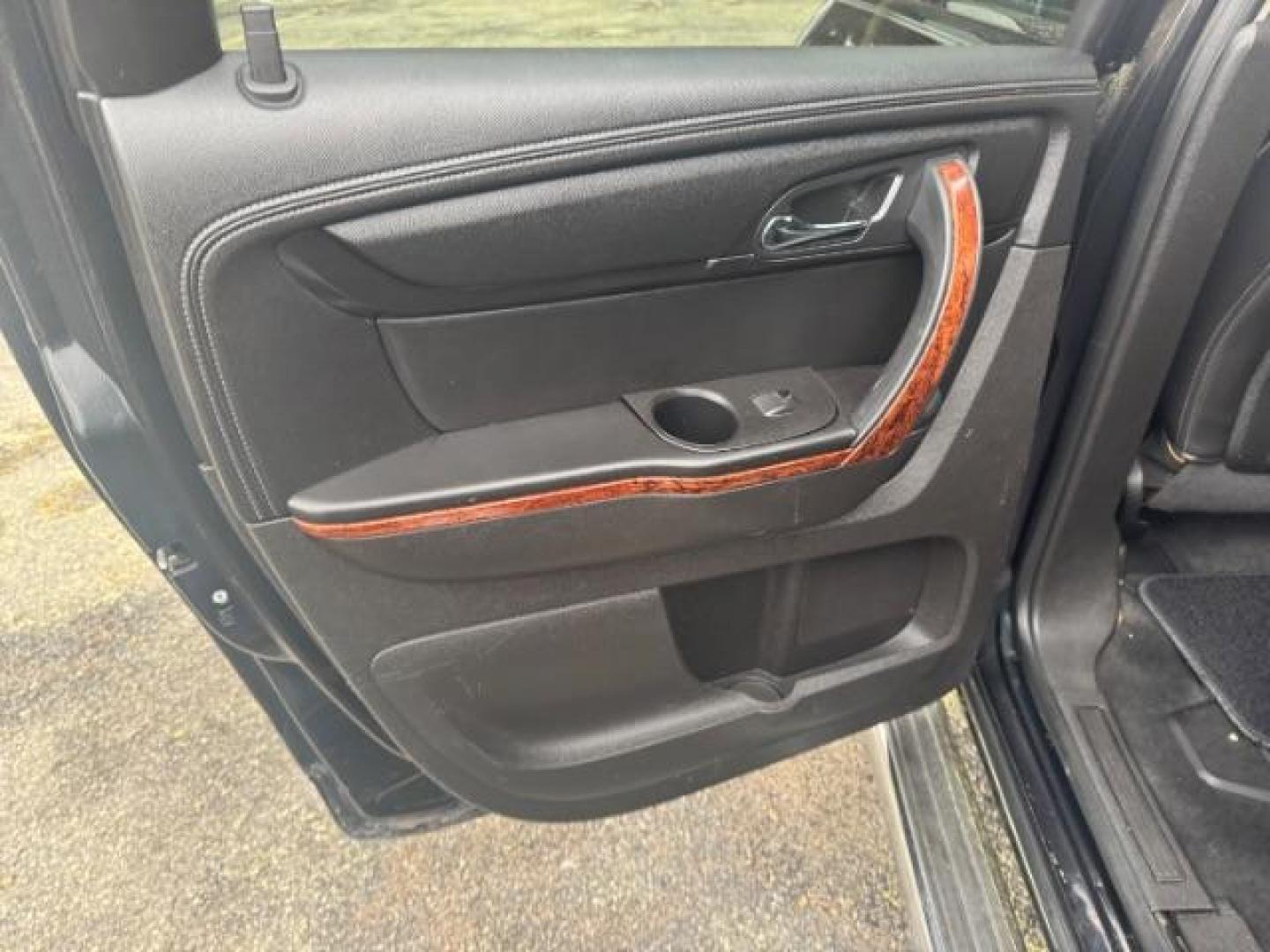 2013 BLACK Chevrolet Traverse LTZ FWD (1GNKRLKD1DJ) with an 3.6L V6 DOHC 24V engine, 6-Speed Automatic transmission, located at 1806 Veterans Memorial Hwy SW, Austell, GA, 30168, (770) 944-9558, 33.817959, -84.606987 - Photo#10