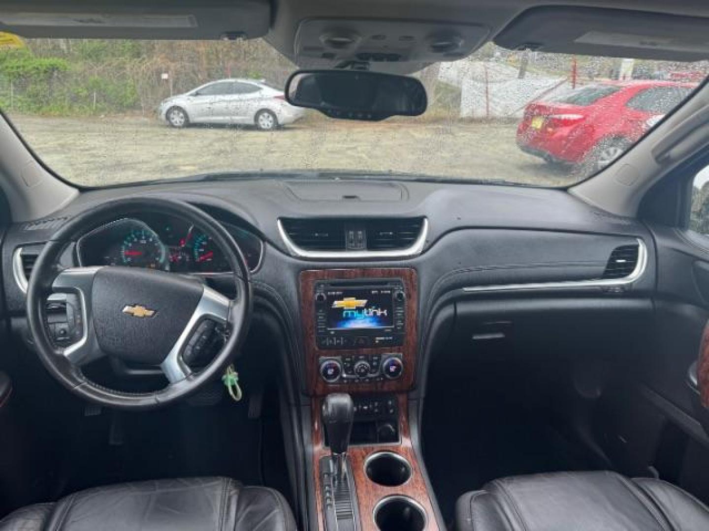 2013 BLACK Chevrolet Traverse LTZ FWD (1GNKRLKD1DJ) with an 3.6L V6 DOHC 24V engine, 6-Speed Automatic transmission, located at 1806 Veterans Memorial Hwy SW, Austell, GA, 30168, (770) 944-9558, 33.817959, -84.606987 - Photo#11