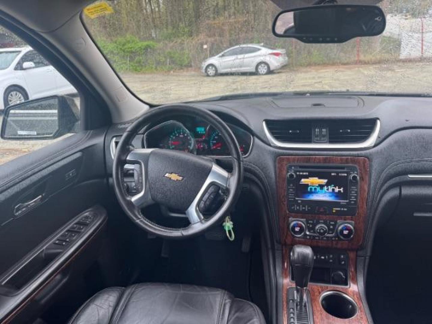 2013 BLACK Chevrolet Traverse LTZ FWD (1GNKRLKD1DJ) with an 3.6L V6 DOHC 24V engine, 6-Speed Automatic transmission, located at 1806 Veterans Memorial Hwy SW, Austell, GA, 30168, (770) 944-9558, 33.817959, -84.606987 - Photo#12