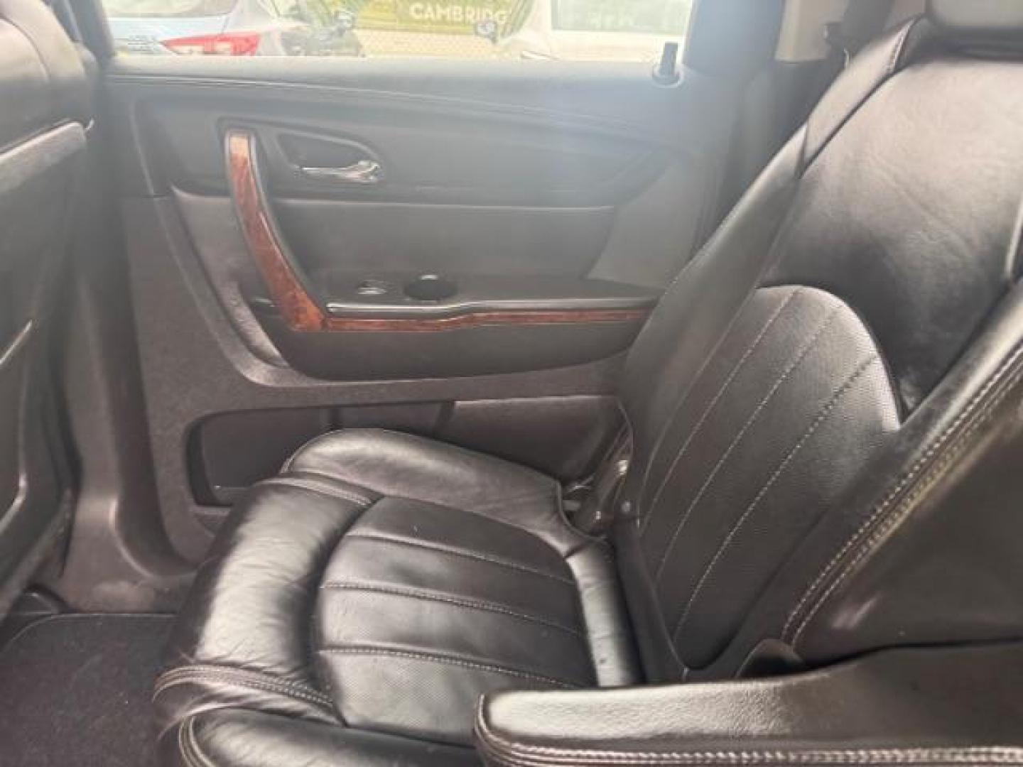 2013 BLACK Chevrolet Traverse LTZ FWD (1GNKRLKD1DJ) with an 3.6L V6 DOHC 24V engine, 6-Speed Automatic transmission, located at 1806 Veterans Memorial Hwy SW, Austell, GA, 30168, (770) 944-9558, 33.817959, -84.606987 - Photo#13