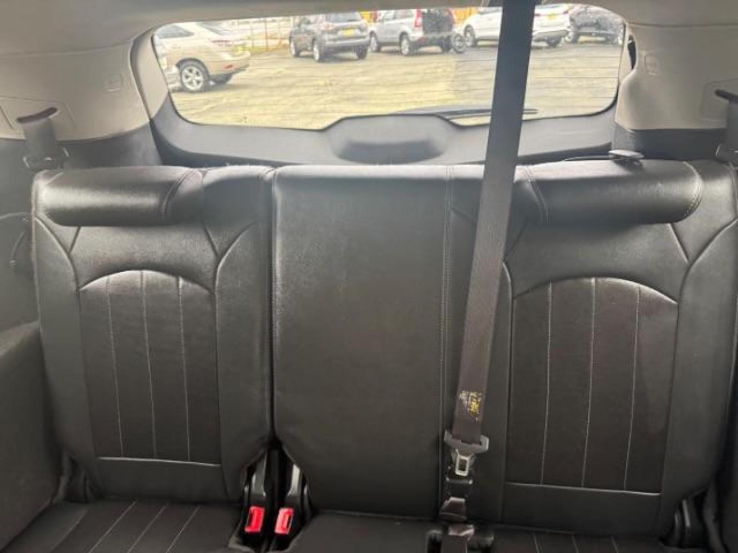 2013 BLACK Chevrolet Traverse LTZ FWD (1GNKRLKD1DJ) with an 3.6L V6 DOHC 24V engine, 6-Speed Automatic transmission, located at 1806 Veterans Memorial Hwy SW, Austell, GA, 30168, (770) 944-9558, 33.817959, -84.606987 - Photo#14